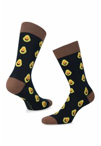 Czarne skarpetki z brązowym ściągaczem i palcami; ozdobione wzorami w żółto-zielone awokado na całej powierzchni. Elastyczny materiał dla komfortu.