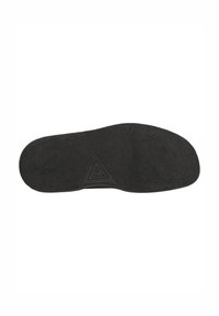 Suola di scarpa in gomma nera con una superficie testurizzata, dotata di un logo triangolare sul tallone e un bordo liscio per maggiore comfort.