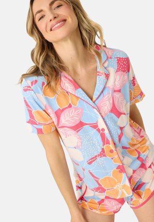 Short-sleeve, button-up floral pajama set featuring a blue background, bright orange and pink flowers, and a relaxed fit.