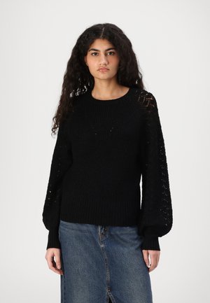 Pulover din tricot negru, cu manșete și corp cu bătături, cu mâneci de tip balon texturate și detalii din dantelă cu model în diamant.