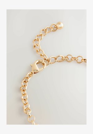 Gold metal chain bracelet featuring oval links, a lobster clasp, and a spherical accent at the end. Smooth, reflective texture.