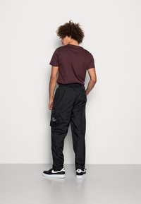 Jordan SUIT PANT - Calças cargo - black