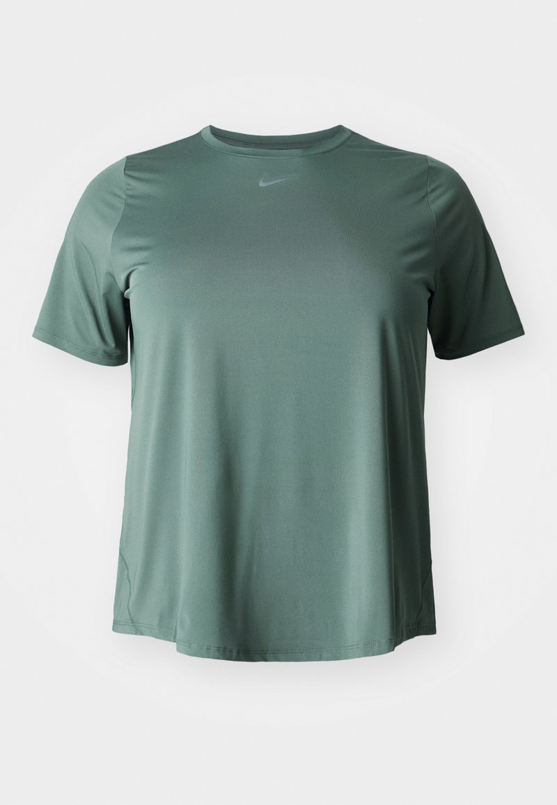 Īsām piedurknēm, apļa kakla t-krekls izsmalcinātā zaļā krāsā. Izgatavots no gluda, viegla auduma ar smalku spīdumu un sudraba Nike swoosh logotipu.