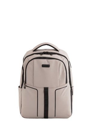 Beige backpack made of fabric, featuring black accents, a top handle, multiple zippered compartments, and side pockets for storage.