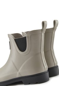 Gray rubber ankle boots with black elastic side panels, textured surface, pull tabs, and a black outsole featuring a tread pattern.