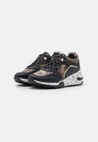Black and brown sneakers featuring a snakeskin texture, mesh accents, and a chunky white speckled sole with black detailing.