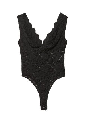 Bodysuit en dentelle noire avec décolleté festonné, motif floral et fermeture à pression au bas. Texture douce, design ajusté et dos ouvert.