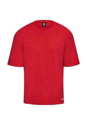 Red cotton t-shirt with a round neckline and short sleeves. Features a straight cut and a small tag at the hem. Simple and solid color design.