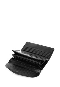 Black leather wallet with a textured interior, multiple card slots, and a zippered compartment. Features a smooth exterior and snap closure.