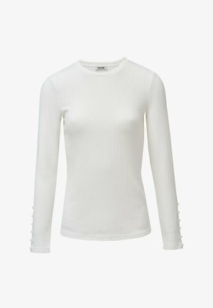 Blusa blanca de manga larga con textura acanalada, escote redondo y detalles de botones en las mangas. Fabricada con una tela suave y elástica.