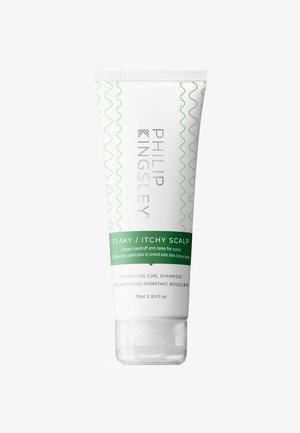 Tube de shampooing hydratant pour boucles Philip Kingsley, étiqueté pour cuir chevelu squameux et irrité, 75 ml, avec accent vert et motif ondulé sur fond blanc.