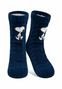 Calzini lavorati a maglia in navy con design a trecce. Presentano una fodera morbida e una grafica di Snoopy bianca sul lato. Altezza della parte superiore corta.