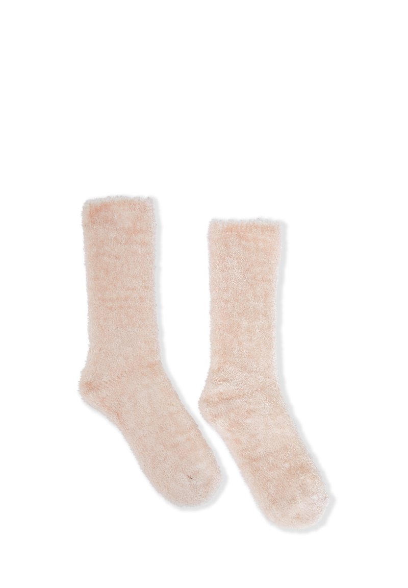Calcetines suaves y esponjosos hasta la rodilla en color rosa claro. Con un acabado peludo y borde superior acanalado para mayor comodidad. Diseñados para mantener el calor y para uso casual.