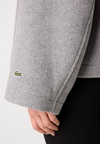 Lacoste Ľahká bunda - pitch chine