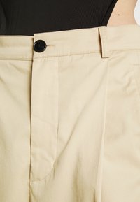 BLANCHE CORTINA PANTS - Pantalon classique - beige