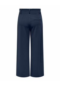 Tumed sinised laiad püksid vöökoolidega ja ühe tagumise kaheõmbluse taskuga, nähtavad tagant.