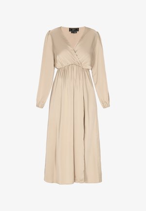 Rochie bej cu mâneci lungi dintr-un material neted; are decolteu în V, talie strânsă și siluetă fluidă cu fustă ușor evazată.