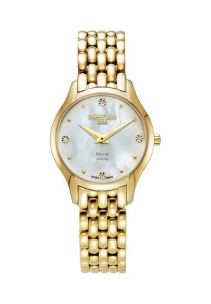 Zlaté hodinky s okrúhlym puzdrom, ciferníkom z perlete, diamantovými akcentmi a náramkom na články. Obsahujú označenie Swiss Made.