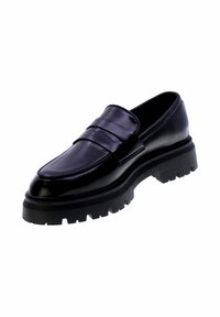 Mocassino in pelle nera con finitura liscia, dotato di due cinturini decorativi, punta rotonda e suola in gomma spessa e robusta.