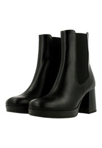 Svarta läderankelboots med elastiska sidopaneler, rund tå och en kraftig hög klack. Slät yta med kontrasterande sömnadsdetaljer.