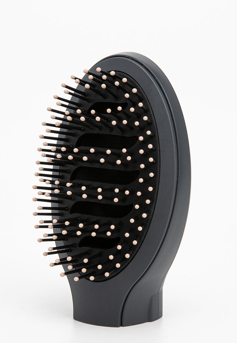 Schwarze Haarbürste mit runder Form, ausgestattet mit flexiblen schwarzen Borsten, die mit pinken Akzenten versehen sind, um sanft zu entwirren. Glatter Griff.