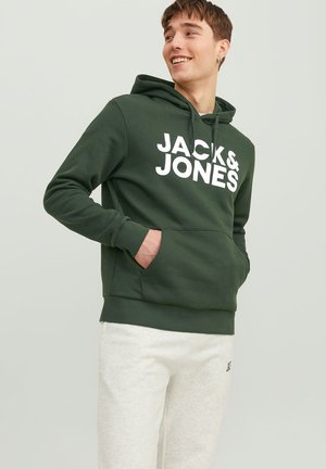 Green hooded sweatshirt with white "JACK & JONES" logo, featuring kangaroo pocket and ribbed cuffs, paired with light gray sweatpants.