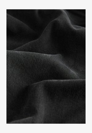 Black fabric with a textured surface, featuring soft, wavy folds. The material appears smooth with a slight sheen, indicating a woven pattern.