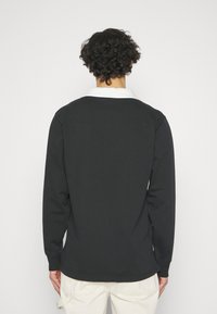 Nike Sportswear TREND RUGBY - Sweatshirt - black/sail