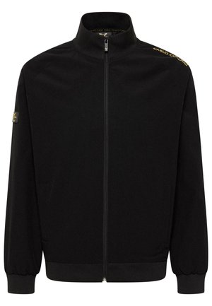 Schwarze Zip-Jacke mit hohem Kragen, gerippten Bündchen und Saum. Verfügt über Logo-Details auf der Schulter und eine glatte Stoffstruktur.