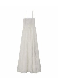 Robe maxi blanche avec des bretelles fines, un corsage smocké, un tissu texturé et une silhouette évasée fluide, dotée d'un motif en quadrillage subtil.
