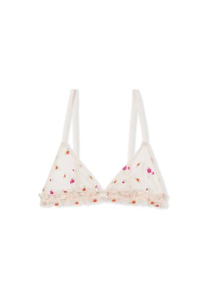 Soutien-gorge beige transparent avec bretelles réglables, petite broderie florale rose et orange, et bordure froufroutante le long du bord inférieur.