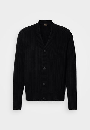 Black knitted cardigan featuring a ribbed texture, V-neckline, and five buttons down the front. Long sleeves with snug cuffs.