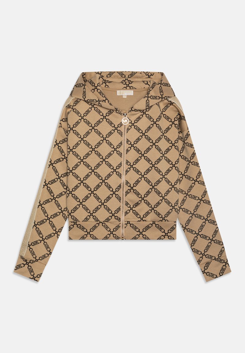Beige zip-up hoodie with black geometric pattern, featuring a hood, long sleeves, and a zipper pull with a logo accent. Soft fabric texture.