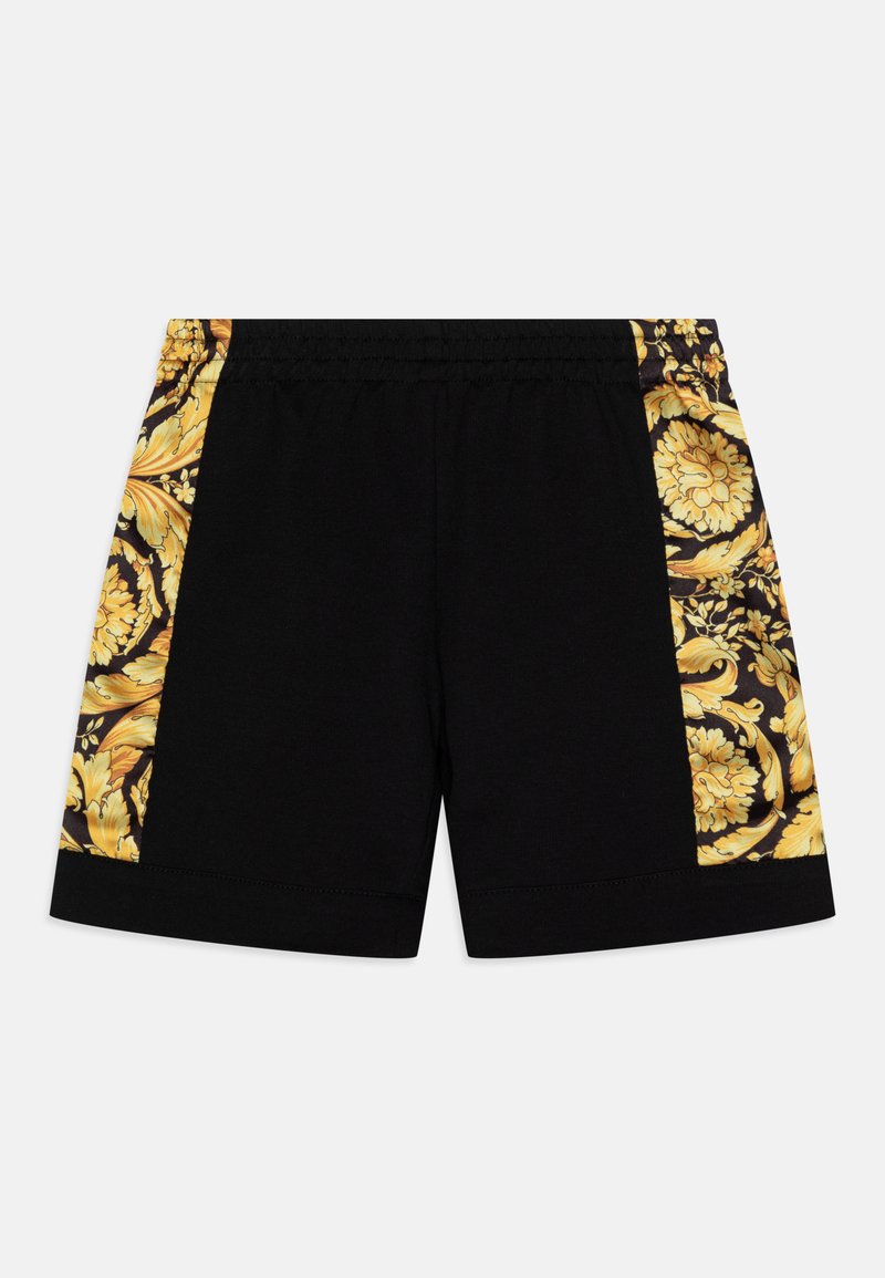 Calções pretos com padrão floral amarelo nas laterais, cintura elástica e textura de algodão suave. Detalhes incluem desenhos intrincados ao longo das bordas.