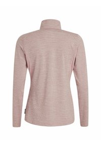 Langærmet skjorte i lyserødt ribbet stof med høj krave og lige kant. Har en subtil struktur og en mærkat på venstre side.