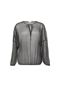 Blouse noire transparente avec des manches longues, des poignets froncés et un col à noeud. Le tissu a un léger éclat métallique et une coupe décontractée.