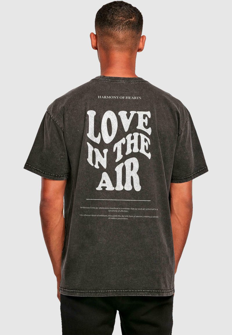 Merchcode LOVE IN THE AIR ACID WASHED HEAVY - T-shirt print - black ...