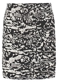 Jupe à motifs abstraits en noir et blanc, coupe droite et longueur mi-cuisse.