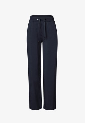 Pantalons de survêtement bleu marine en tissu doux, dotés d'une taille élastique, d'une fermeture à cordon et d'un design à jambes droites. Sans poches.