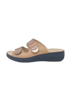 Sandalo beige aperto con due cinturini in velcro regolabili e suola imbottita nera, progettato per il comfort e l'uso casual.