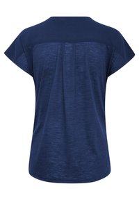 Haut femme bleu marine à manches courtes avec empiècement supérieur uni et couture verticale discrète au centre du dos.