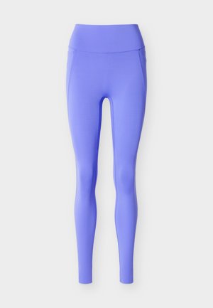 Höga leggings i livfull lila. Gjorda av mjukt, stretchigt tyg med en figursydd design utan synliga mönster eller detaljer.
