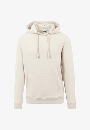 Beige hoodie gemaakt van zachte stof, met een voorzak, verstelbare trekkoorden en geribde manchetten. Glad textuur.