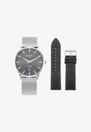Orologio da polso Roamer Valais con quadrante grigio, cinturino in maglia d’argento, datario e due cinturini intercambiabili in pelle nera con fibbia.
