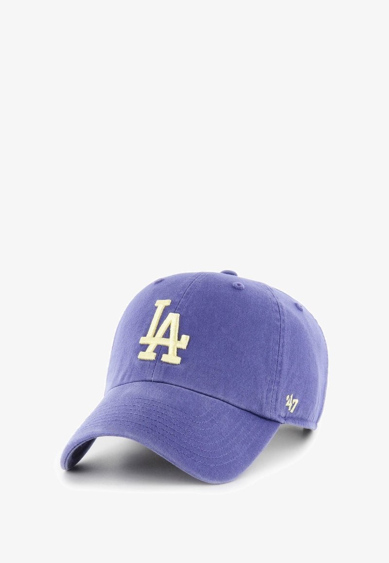 Purple baseball cap made of cotton with a curved brim, featuring an embroidered yellow "LA" logo on the front and a small "47" on the side.