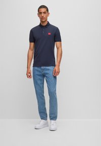 HUGO DERESO - Polo shirt - dark blue