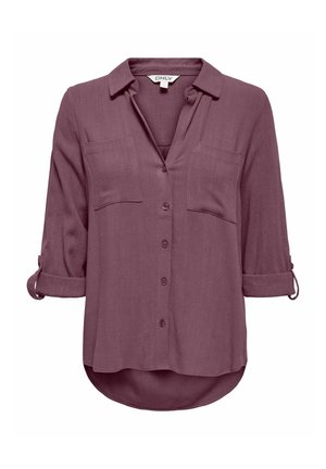 Naiste mauve-nuppudega särk kraega, pika varrukaga, mis on üles keeratud, kahe rinnataskuga ja kaardus äärega.