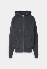 Felpa con zip di colore grigio scuro, realizzata in misto cotone, con tasca a marsupio, cappuccio regolabile con cordino e piccolo logo ricamato sul petto.