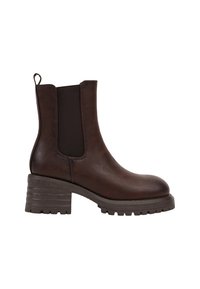 Bottes en cuir marron à cheville avec des panneaux latéraux élastiques, bout rond et talon épais texturé. Comprend une languette pour un enfilage facile.