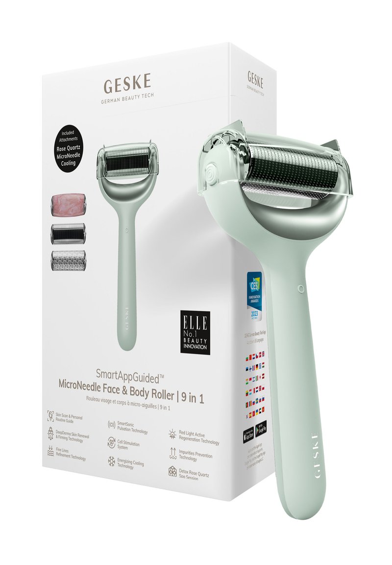 Roulette de micro-aiguille pour le visage et le corps avec un manche vert menthe, une tête de rouleau métallique et trois embouts pour différents usages de soins de la peau. Emballage en boîte.